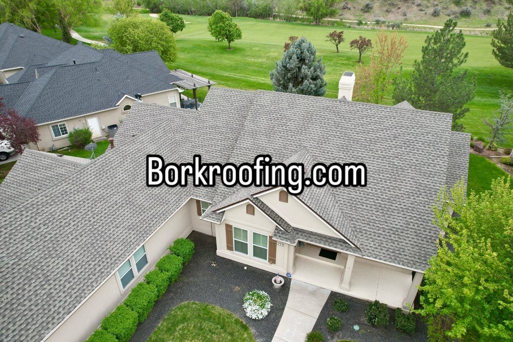 Aerial view of a new architectural shingle roof on a golf course home in Banbury Meadows, Eagle, Idaho